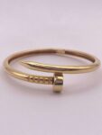 Brazalete tipo aro en oro amarillo  - talla 15 cms