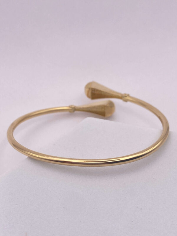 Brazalete tipo aro en oro amarillo  - talla 16 cms